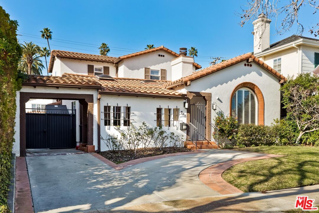 245 South Oakhurst Drive Beverly Hills, CA 90212 - Photo 1 of 21 a front view of a house