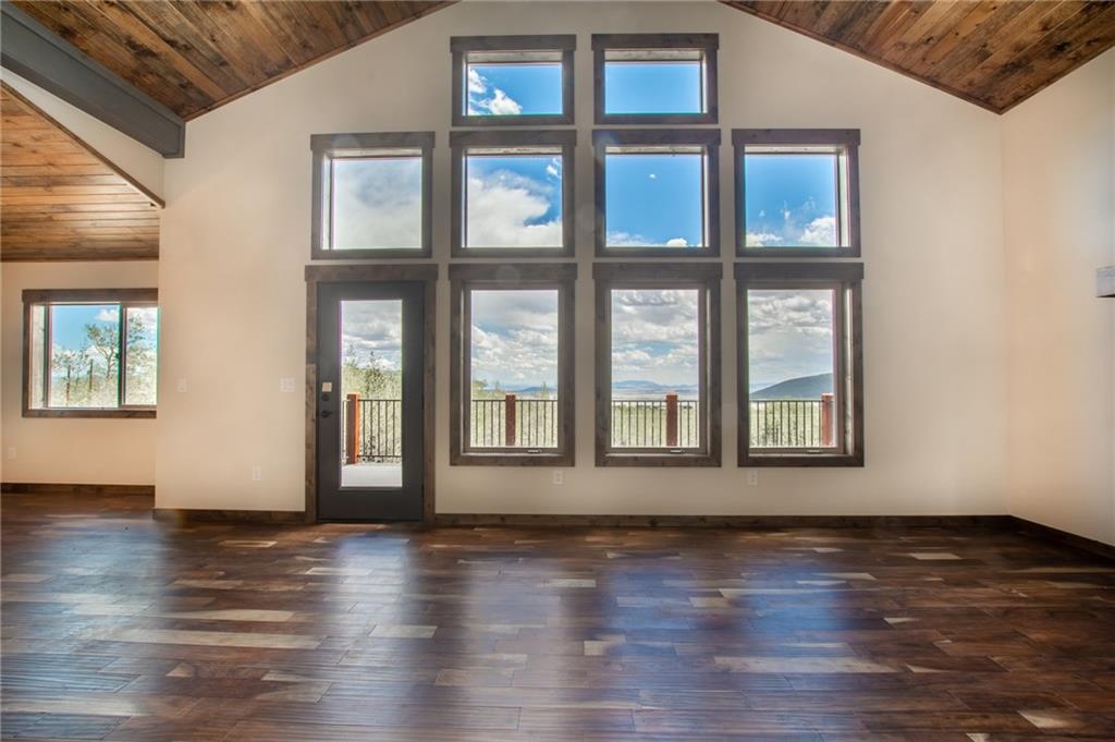 2267 High Creek Road Fairplay, CO 80440 - Photo 12 of 21 a view of an empty room with wooden floor and a window