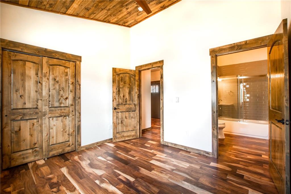 2267 High Creek Road Fairplay, CO 80440 - Photo 16 of 21 a view of an empty room with wooden floor and a window