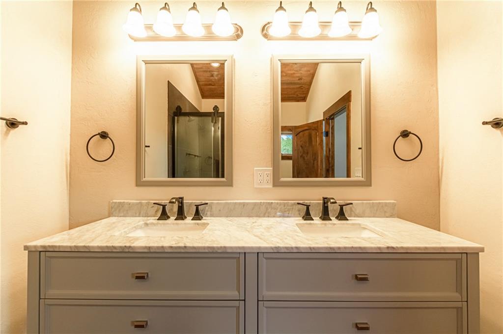 2267 High Creek Road Fairplay, CO 80440 - Photo 9 of 21 a bathroom with a granite countertop sink mirror and