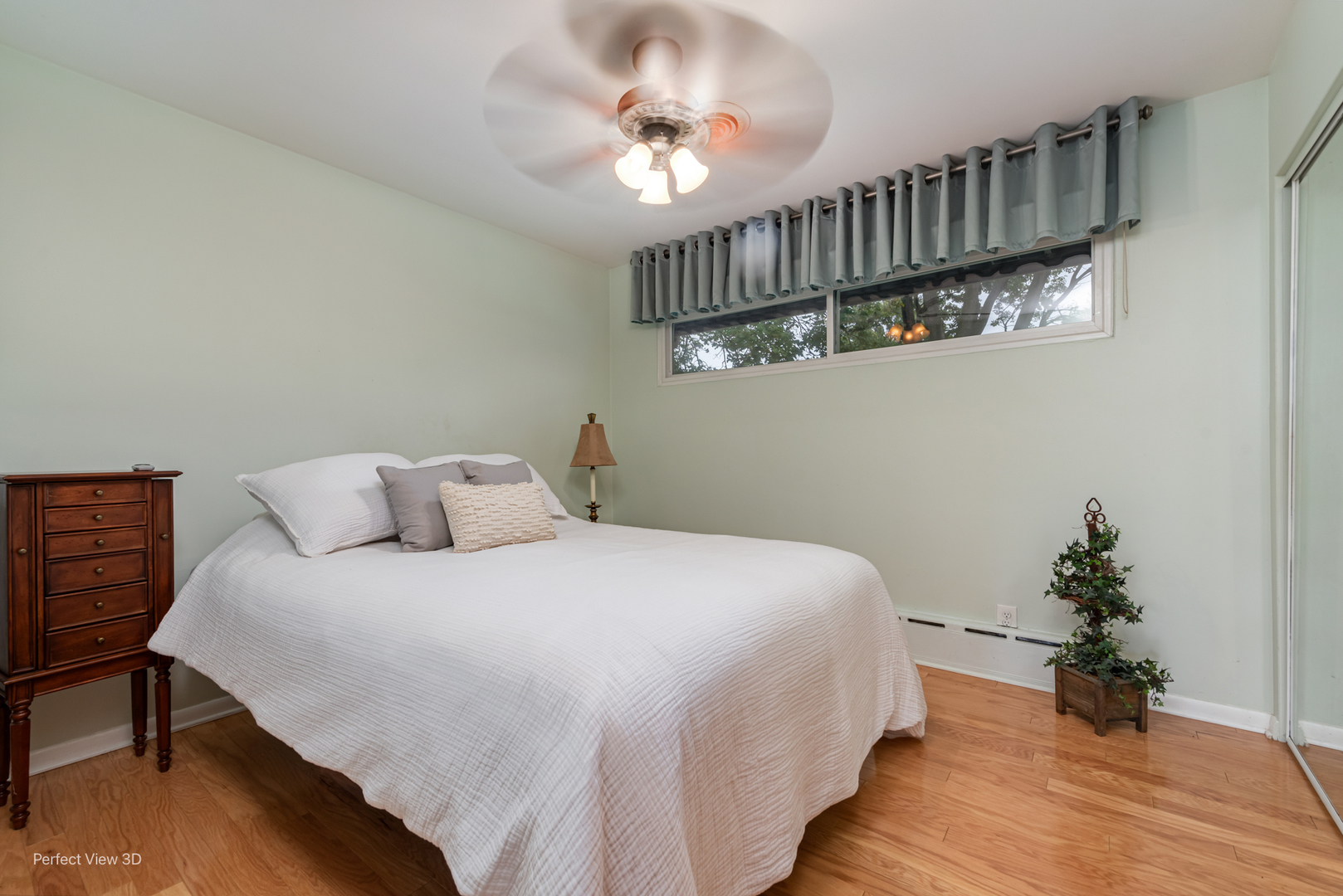 2004 Boehme Street Lockport, IL 60441 - Photo 14 of 23 a bedroom with a bed and a chandelier