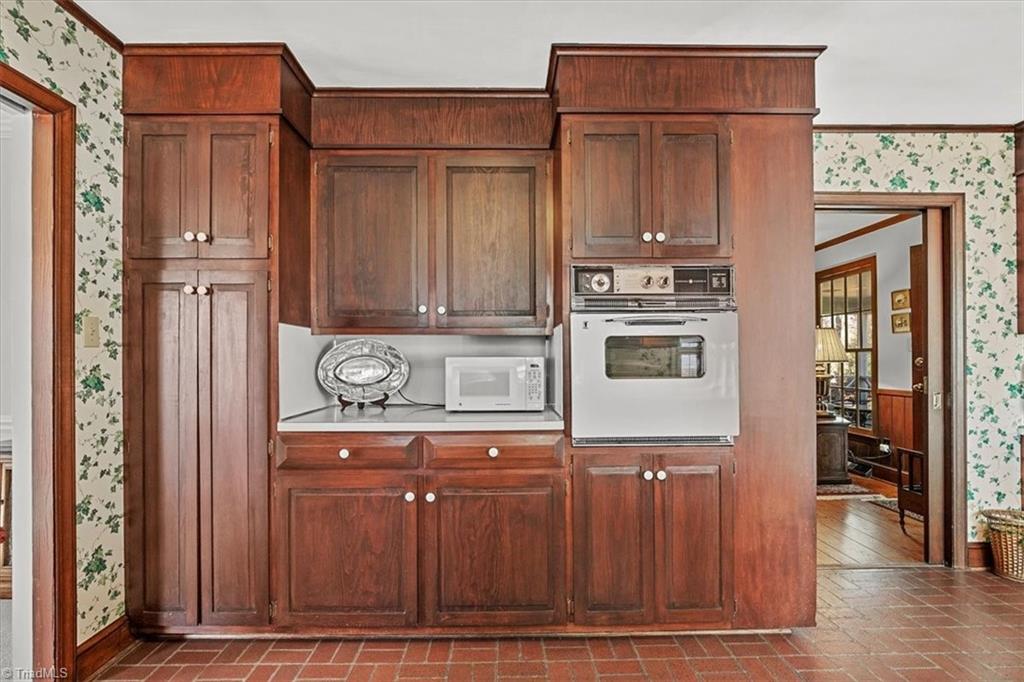 952 Nottingham Road High Point, NC 27262 - Photo 16 of 47 Cabinets have deep storage
