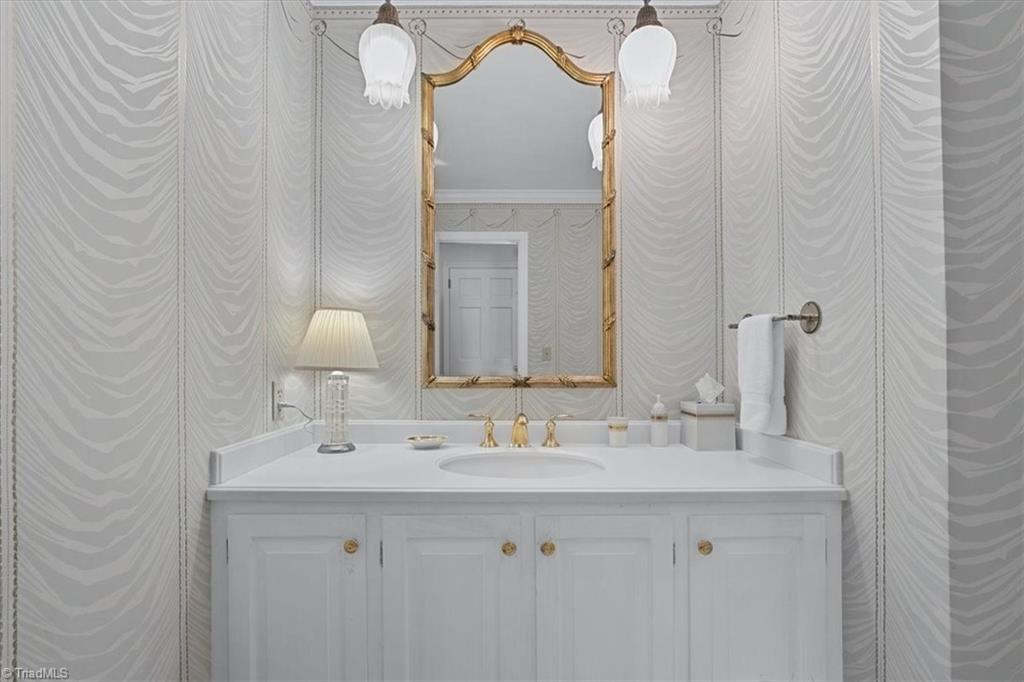 952 Nottingham Road High Point, NC 27262 - Photo 28 of 47 Hall bathoom on main level with Corian countertops.