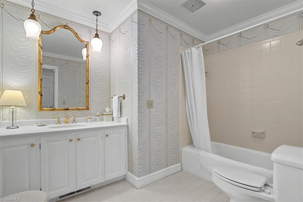 952 Nottingham Road High Point, NC 27262 - Photo 29 of 47 Hall bathroom features tile floors.