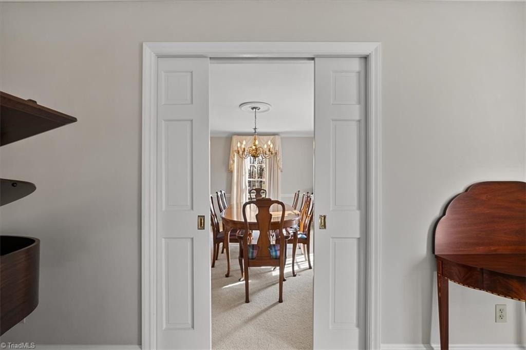 952 Nottingham Road High Point, NC 27262 - Photo 9 of 47 Pocket doors from living room into the dining room.