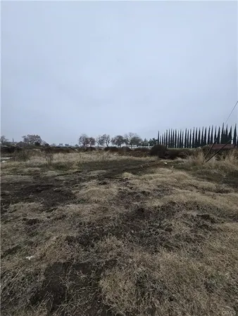 a view of a water covered with fog