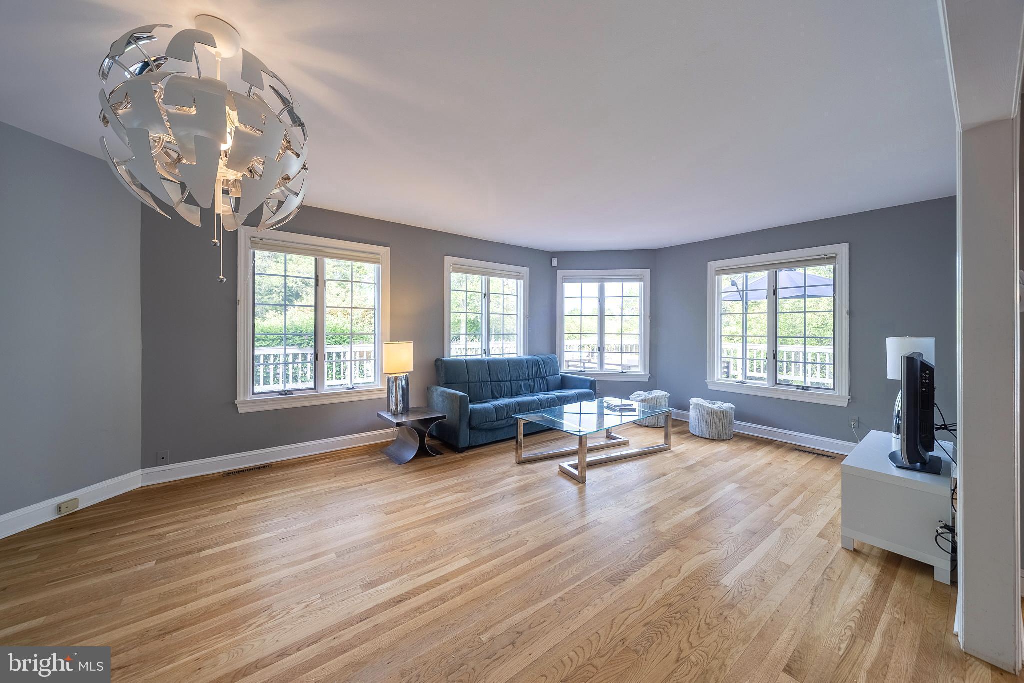 616 Scotch Road Pennington, NJ 08534 - Photo 15 of 46 Family room with great windows overlooking deck.