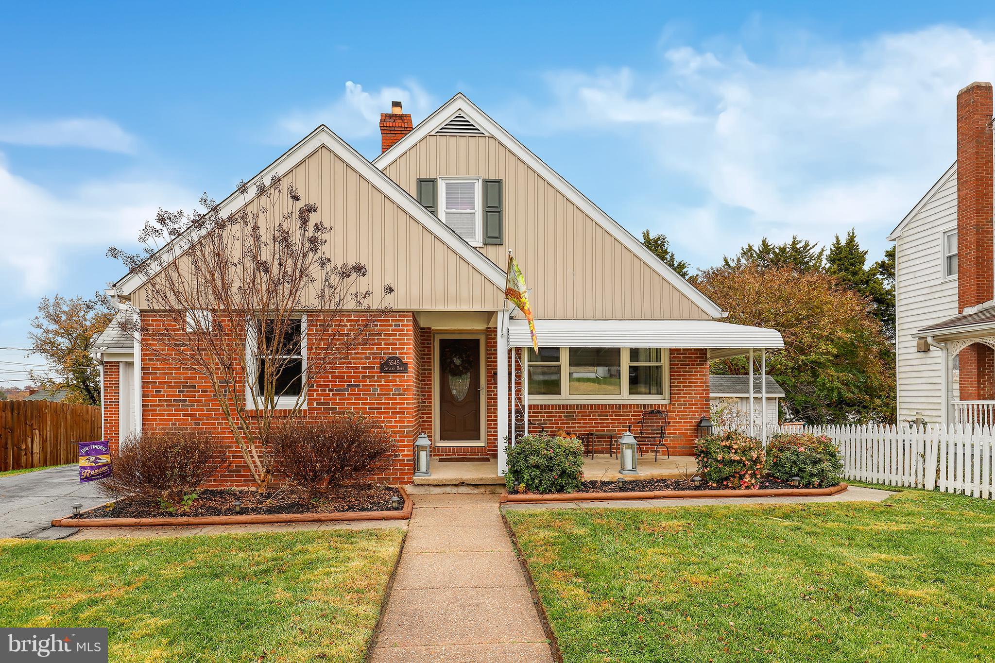 5545 Gayland Road Baltimore, MD 21227 - Photo 1 of 30 a front view of a house with a yard