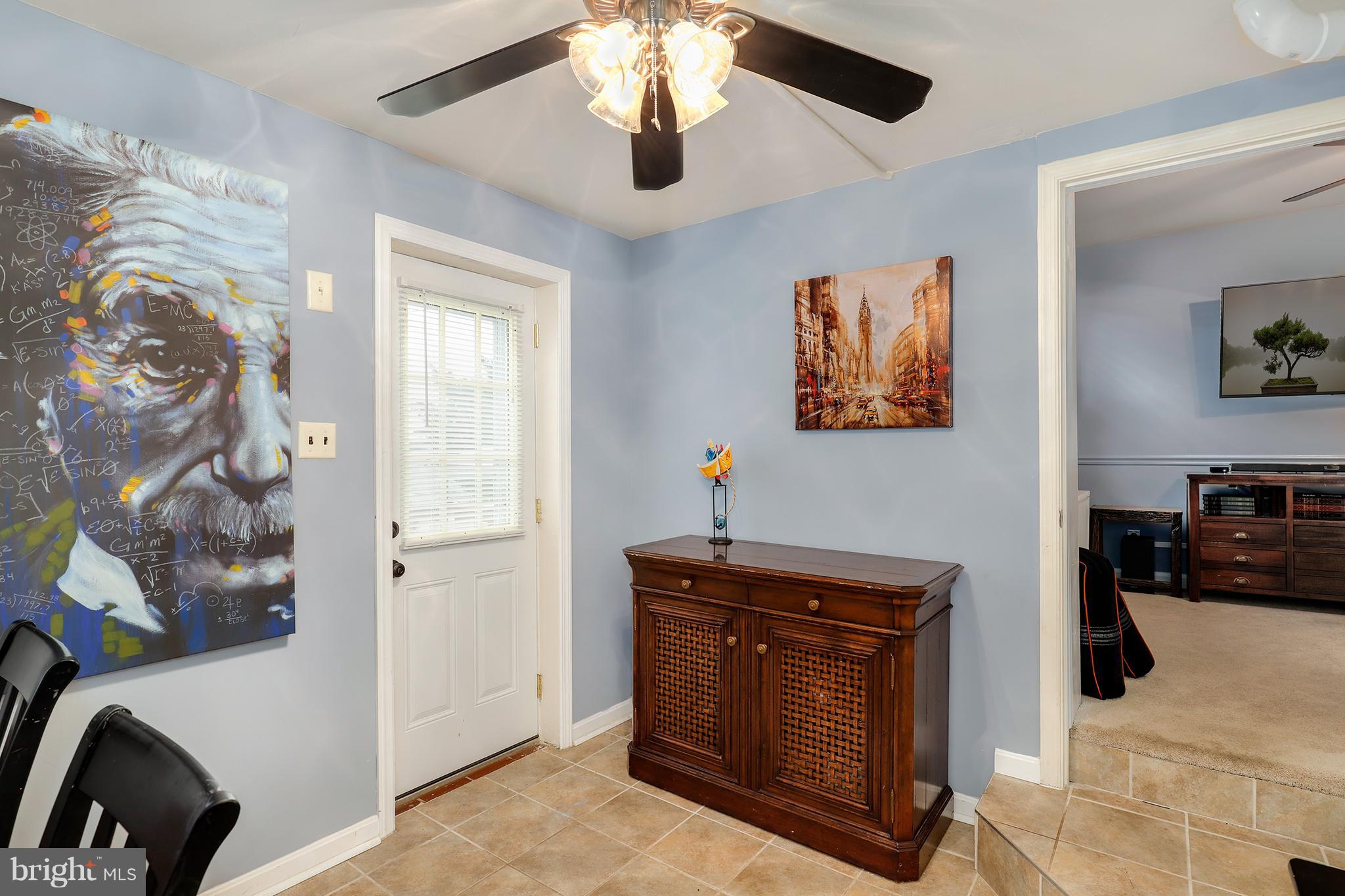 5545 Gayland Road Baltimore, MD 21227 - Photo 14 of 30 a view of a hallway with workspace and a window