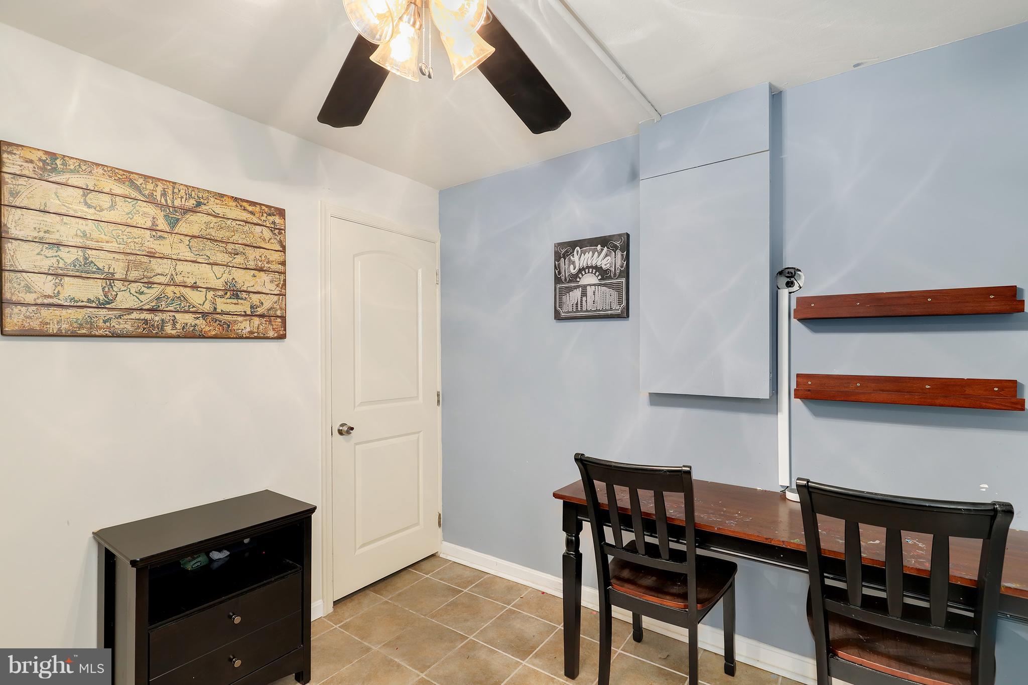 5545 Gayland Road Baltimore, MD 21227 - Photo 15 of 30 a view of a dining room with furniture