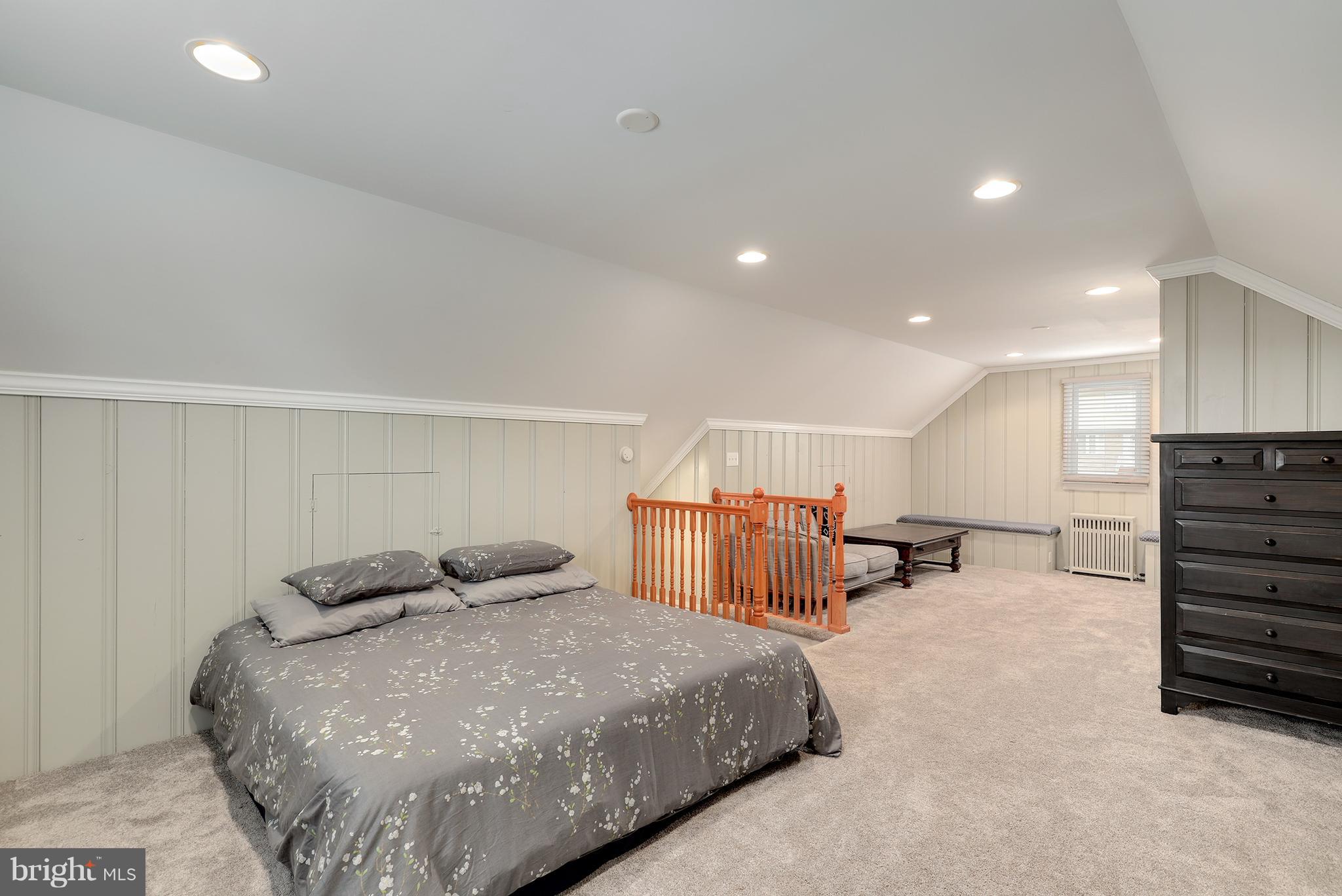 5545 Gayland Road Baltimore, MD 21227 - Photo 19 of 30 a bedroom with bed and window