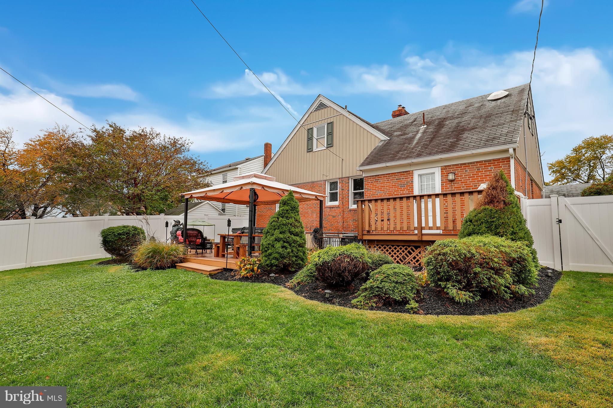 5545 Gayland Road Baltimore, MD 21227 - Photo 26 of 30 a front view of a house with garden