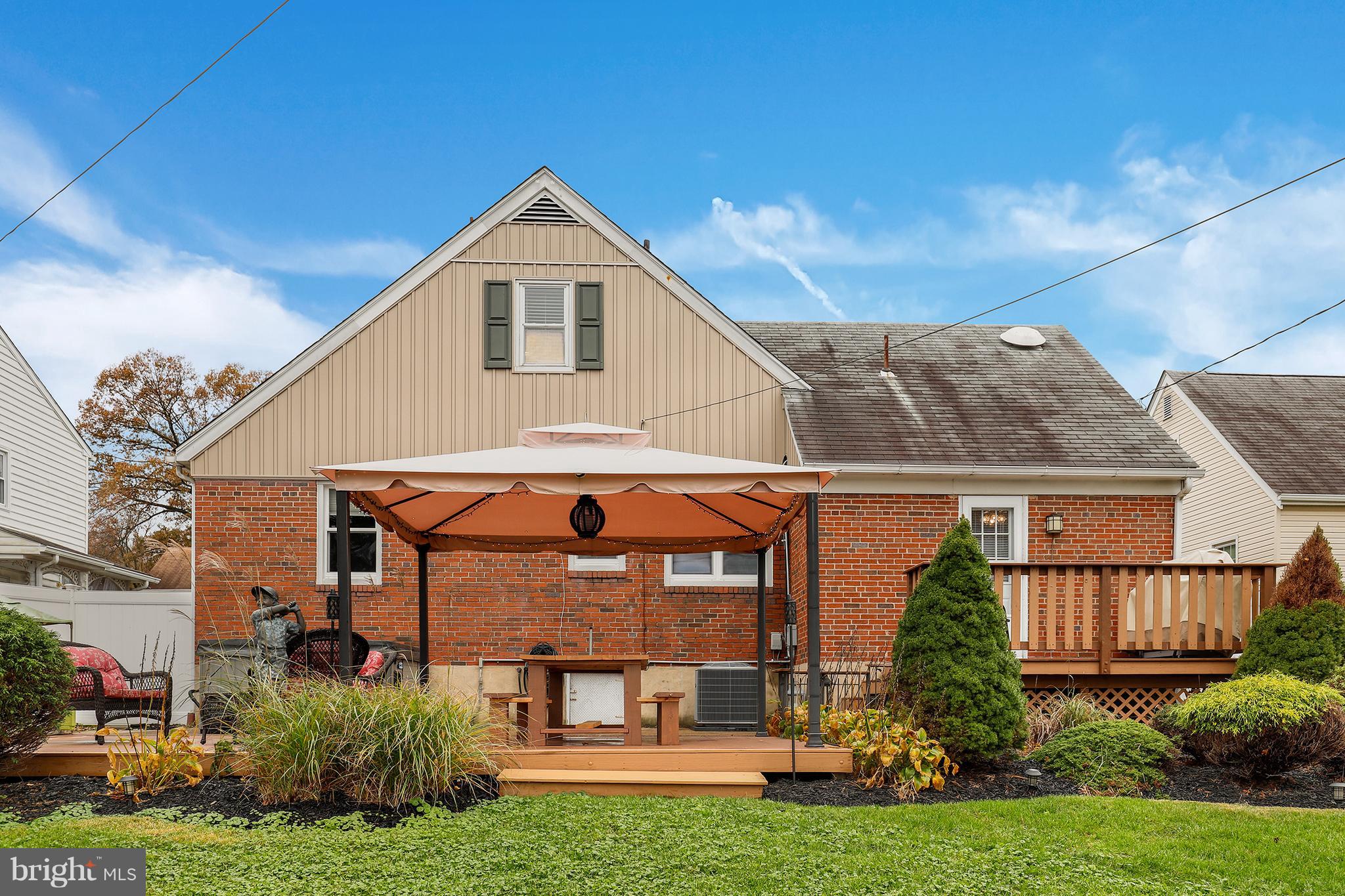 5545 Gayland Road Baltimore, MD 21227 - Photo 27 of 30 a view of a house with yard and plants