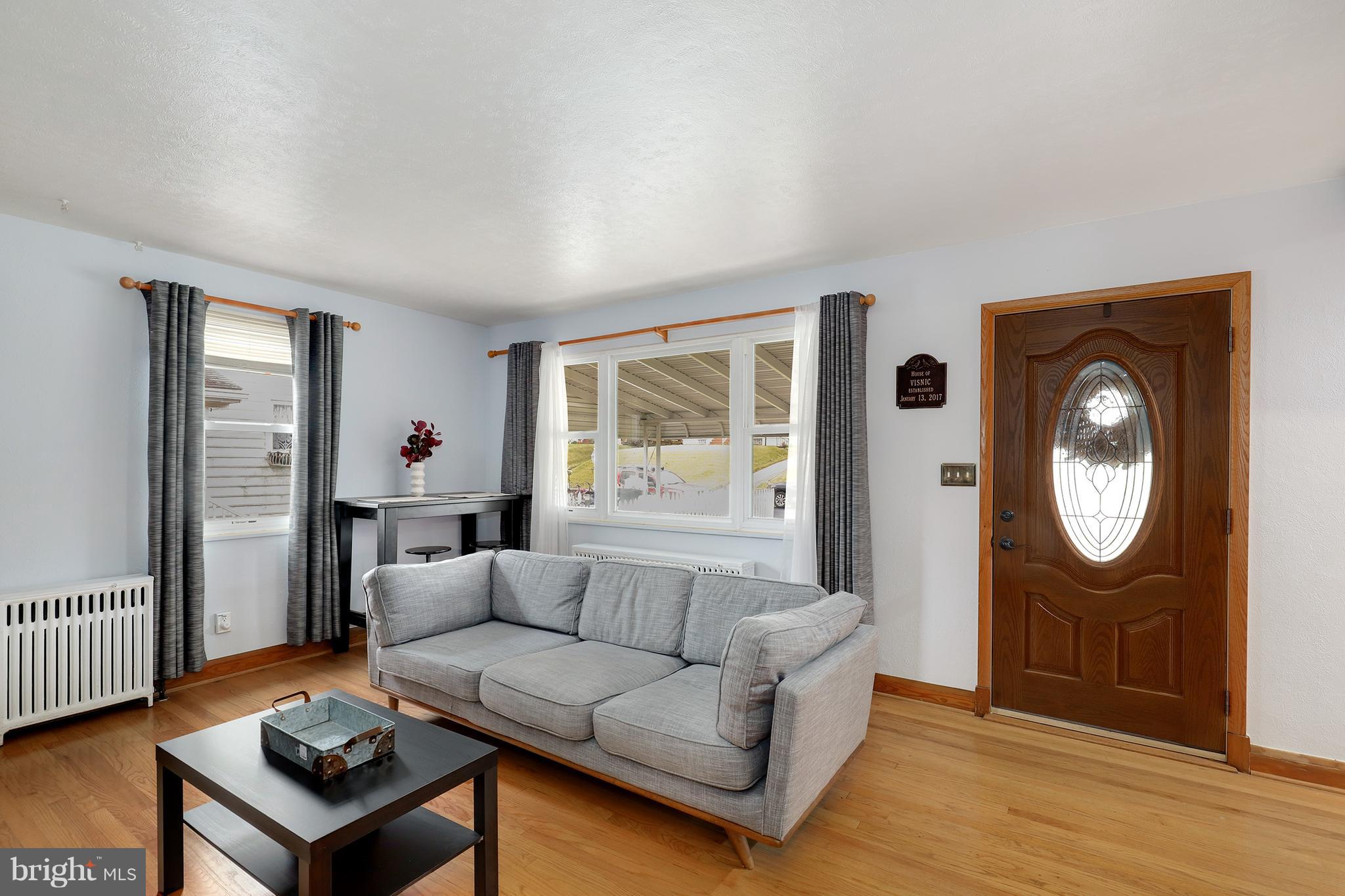 5545 Gayland Road Baltimore, MD 21227 - Photo 5 of 30 a living room with furniture and a window