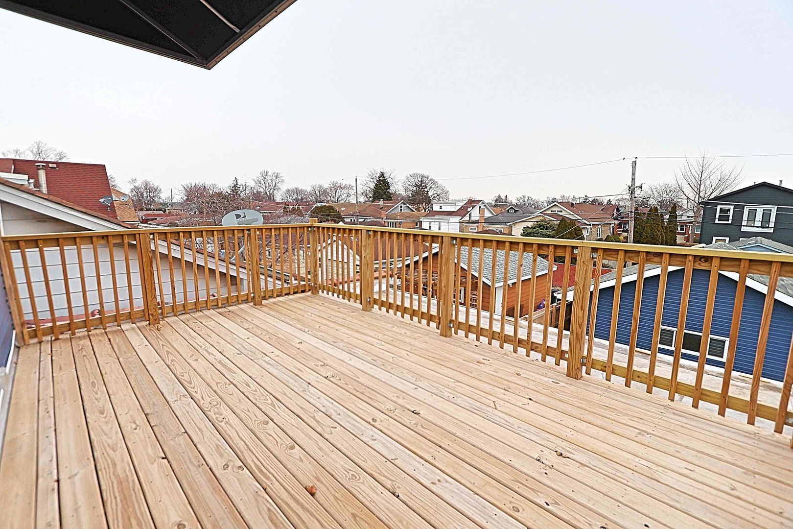 2733 Wesley Avenue Berwyn, IL 60402 - Photo 32 of 33 a view of wooden balcony with city view