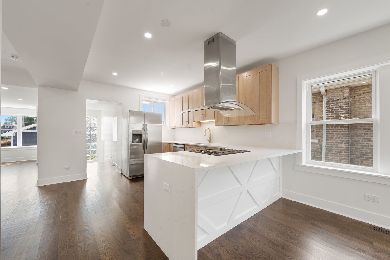 2733 Wesley Avenue Berwyn, IL 60402 - Photo 4 of 33 a open kitchen with white cabinets and wooden floor