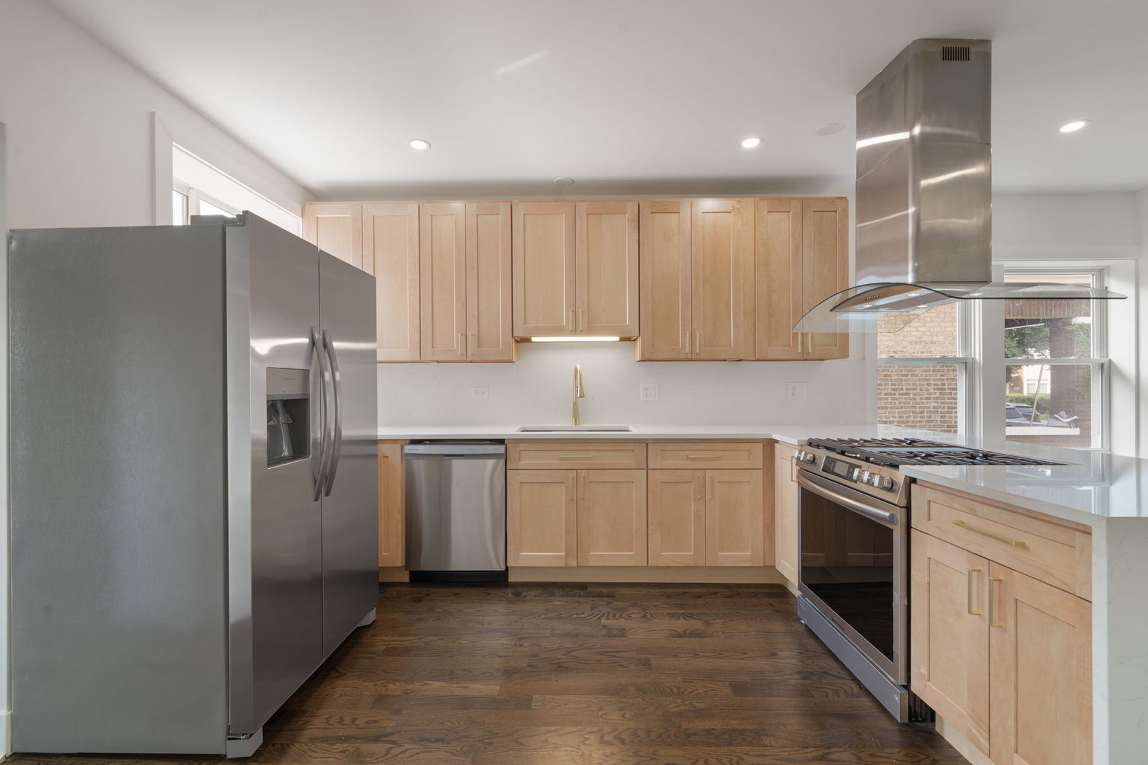 2733 Wesley Avenue Berwyn, IL 60402 - Photo 6 of 33 a kitchen with stainless steel appliances granite countertop a refrigerator oven a sink and dishwasher