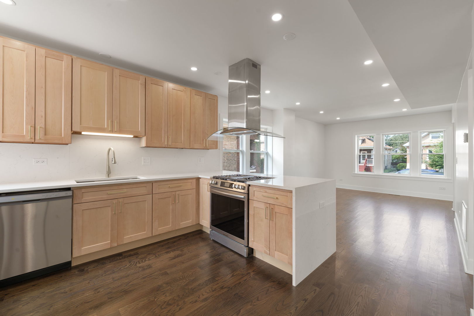 2733 Wesley Avenue Berwyn, IL 60402 - Photo 7 of 33 a kitchen with stainless steel appliances granite countertop a stove and a sink