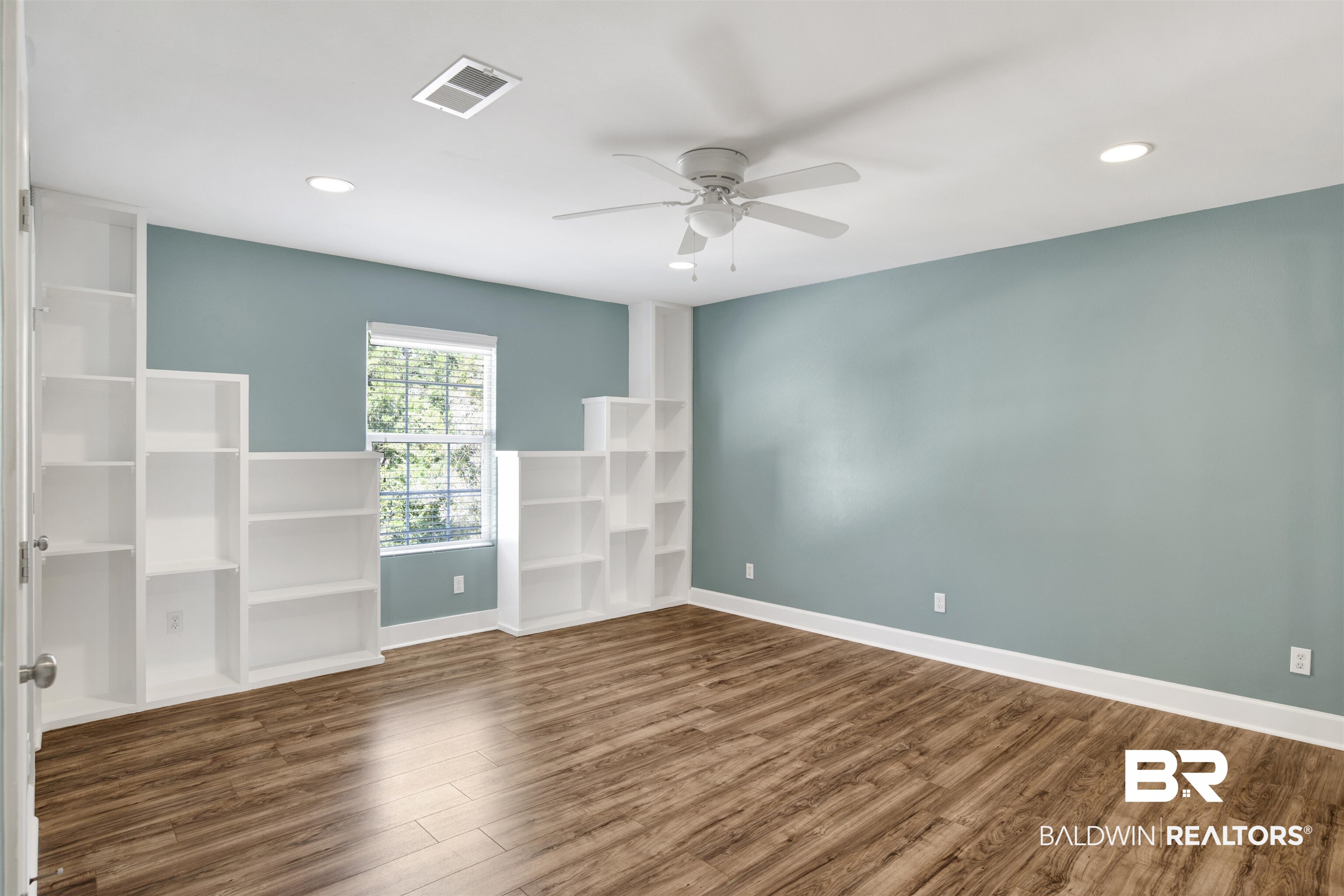 11835 Island Drive Foley, AL 36535 - Photo 35 of 53 Unfurnished room featuring wood finished floors, recessed lighting, and ceiling fan
