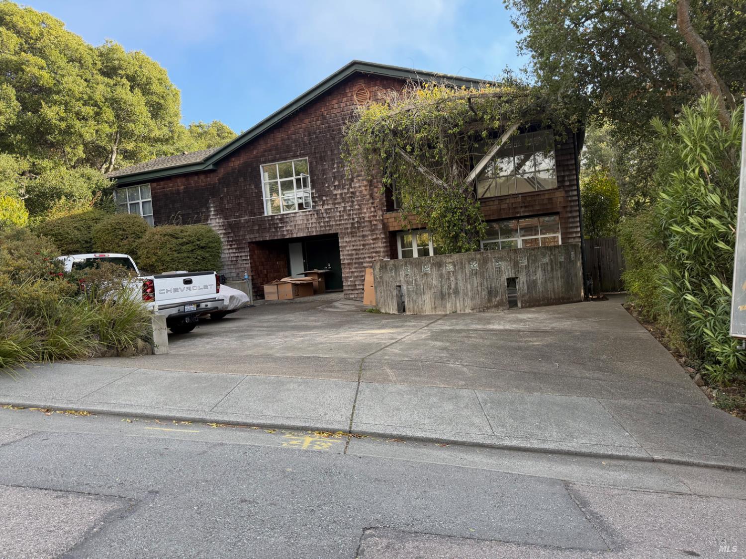 4 Tara Hill Road Tiburon, CA 94920 - Photo 1 of 1 a front view of a house with a yard