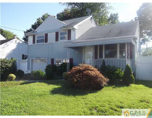 19 Wilshire Road Edison, NJ 08817 - Photo 1 of 7 a view of a house with backyard and garden