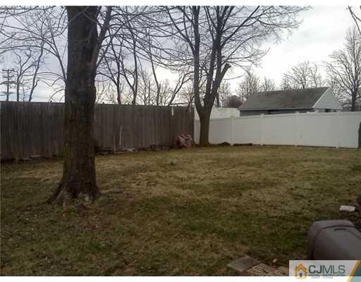 19 Wilshire Road Edison, NJ 08817 - Photo 7 of 7 a view of a yard