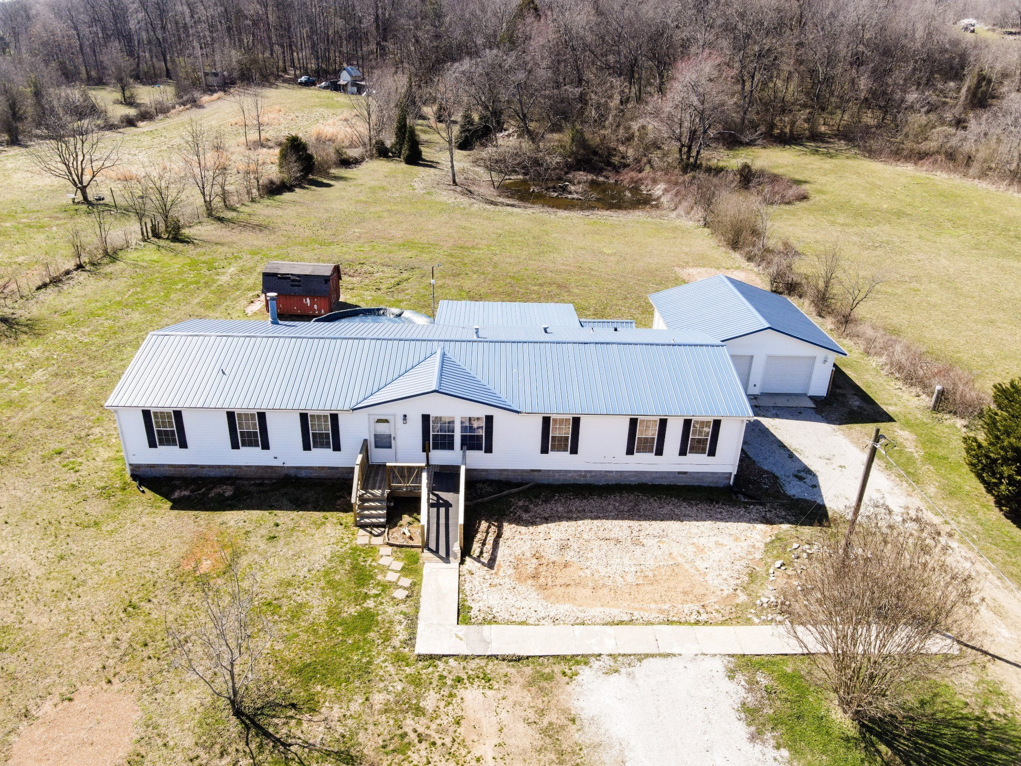 1606 Harpo Road Manchester, TN 37355 - Photo 2 of 27 a view of a house with outdoor space