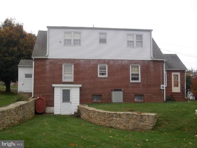 783 McCauley Road Conowingo, MD 21918 - Photo 3 of 20 front view of a house with a yard