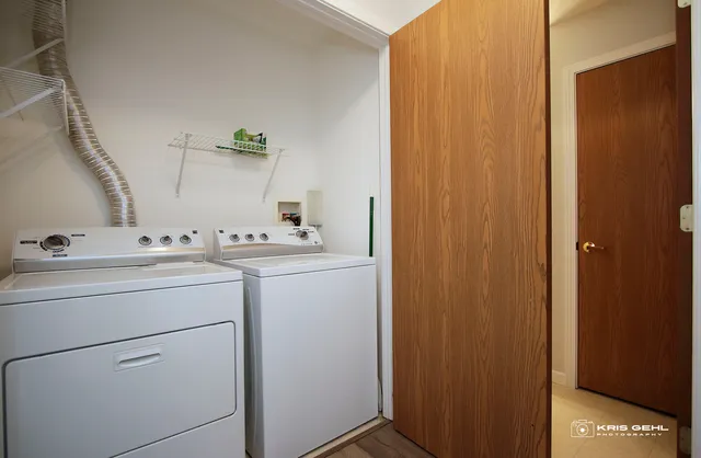 a utility room with dryer and washer