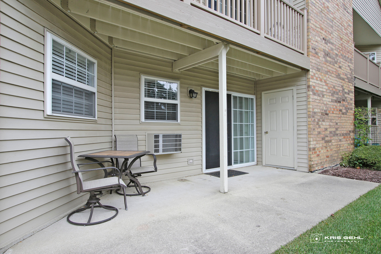 1551 Crystal Rock Court, Unit 1D Round Lake Beach, IL 60073 - Photo 16 of 16 a view of a chair and table in the house