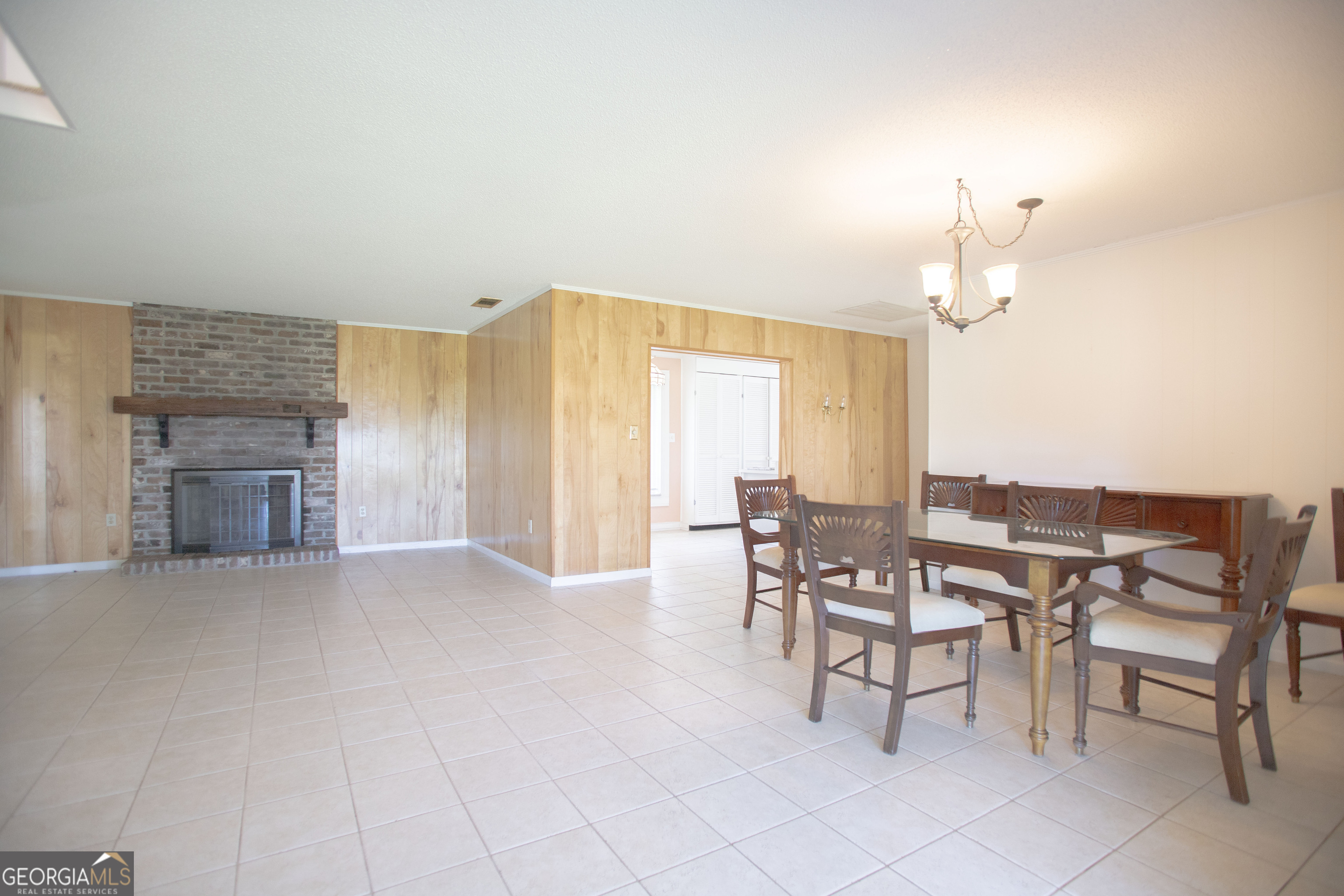 743 Cattle Hammock Road Midway, GA 31320 - Photo 20 of 63 a view of a livingroom with furniture and a fireplace