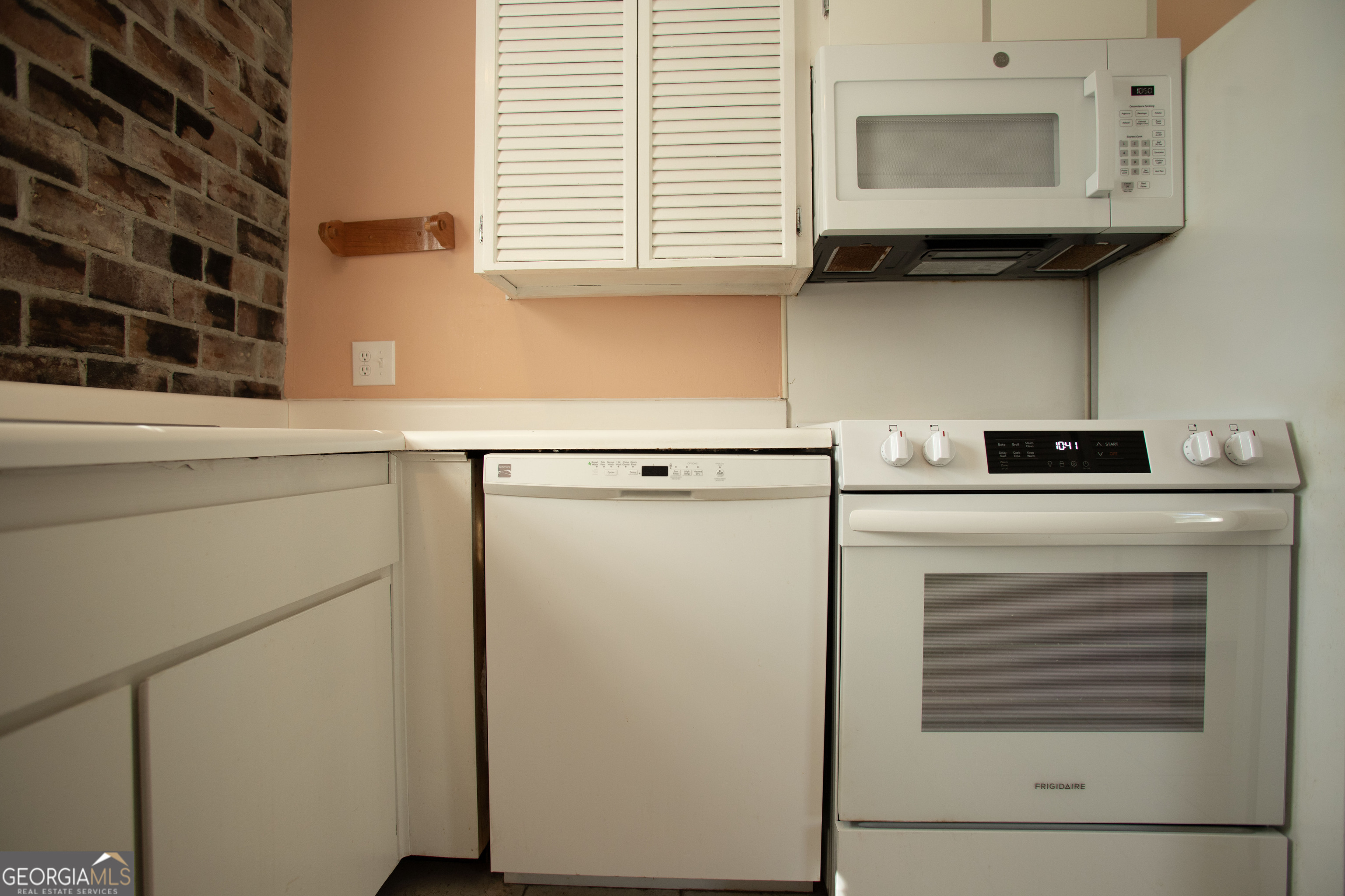 743 Cattle Hammock Road Midway, GA 31320 - Photo 23 of 63 a kitchen with a cabinets and a stove