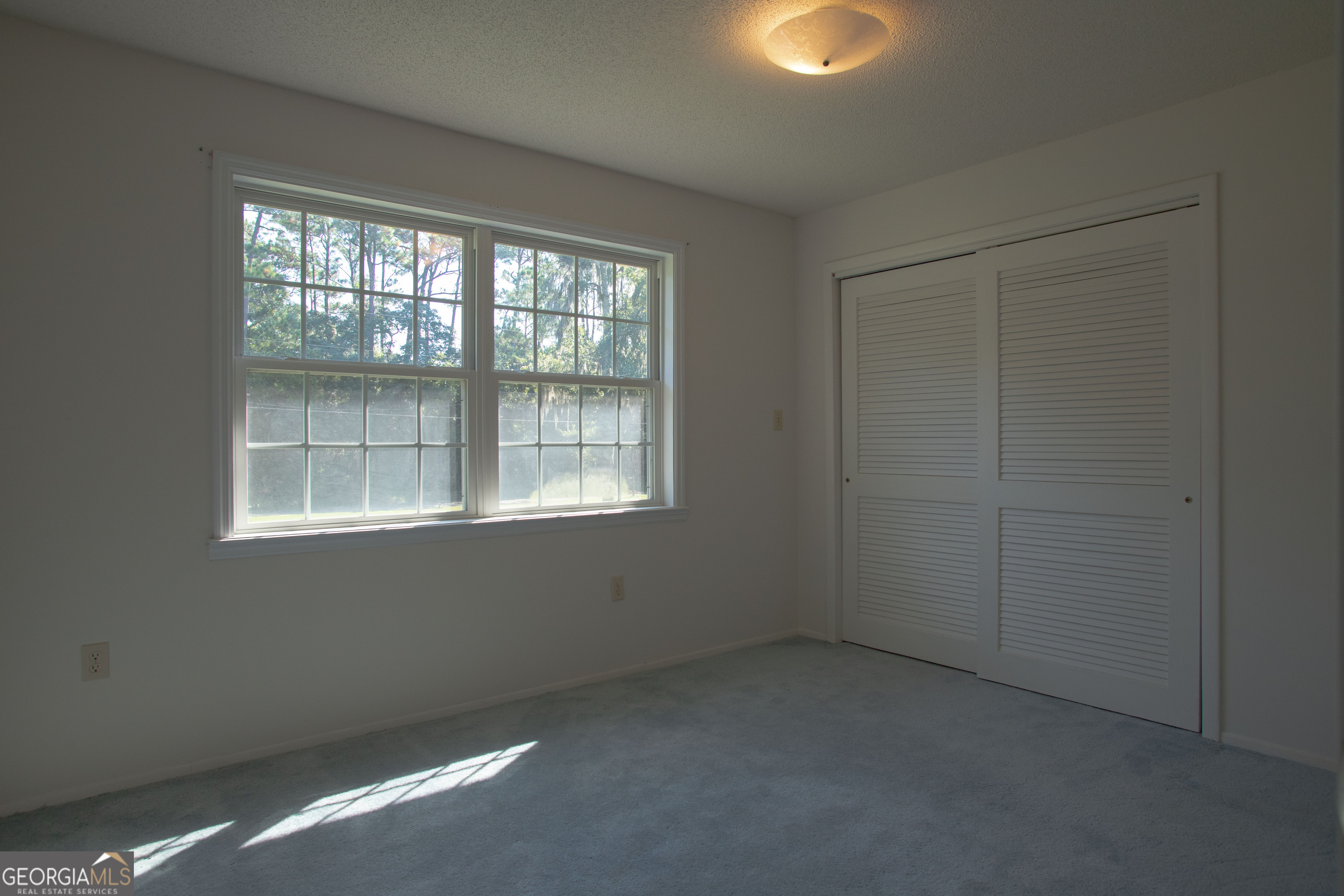 743 Cattle Hammock Road Midway, GA 31320 - Photo 31 of 63 an empty room with windows