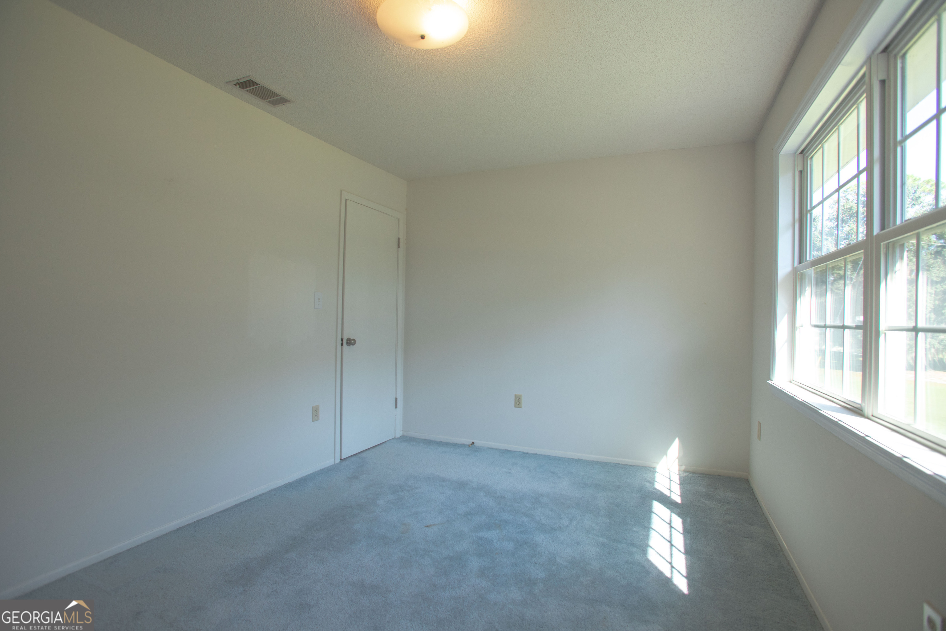 743 Cattle Hammock Road Midway, GA 31320 - Photo 39 of 63 an empty room with windows