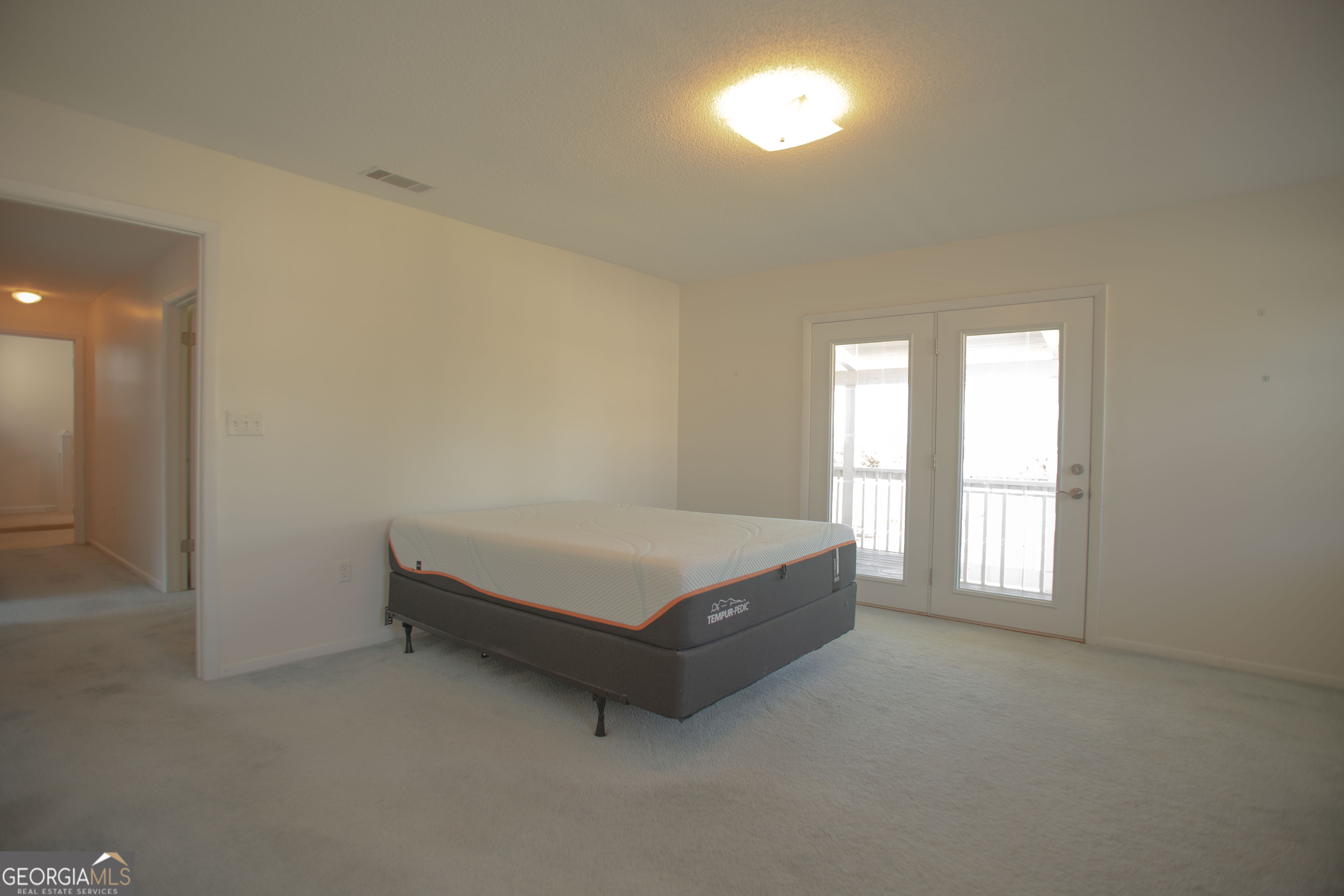 743 Cattle Hammock Road Midway, GA 31320 - Photo 44 of 63 a room with a bed and window
