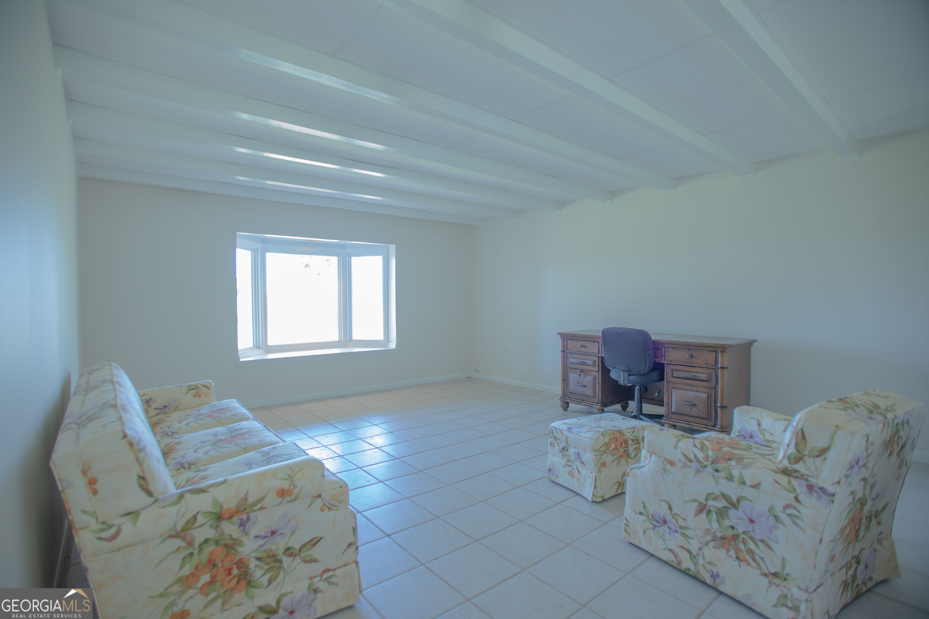743 Cattle Hammock Road Midway, GA 31320 - Photo 52 of 63 a bed room with furniture and a window