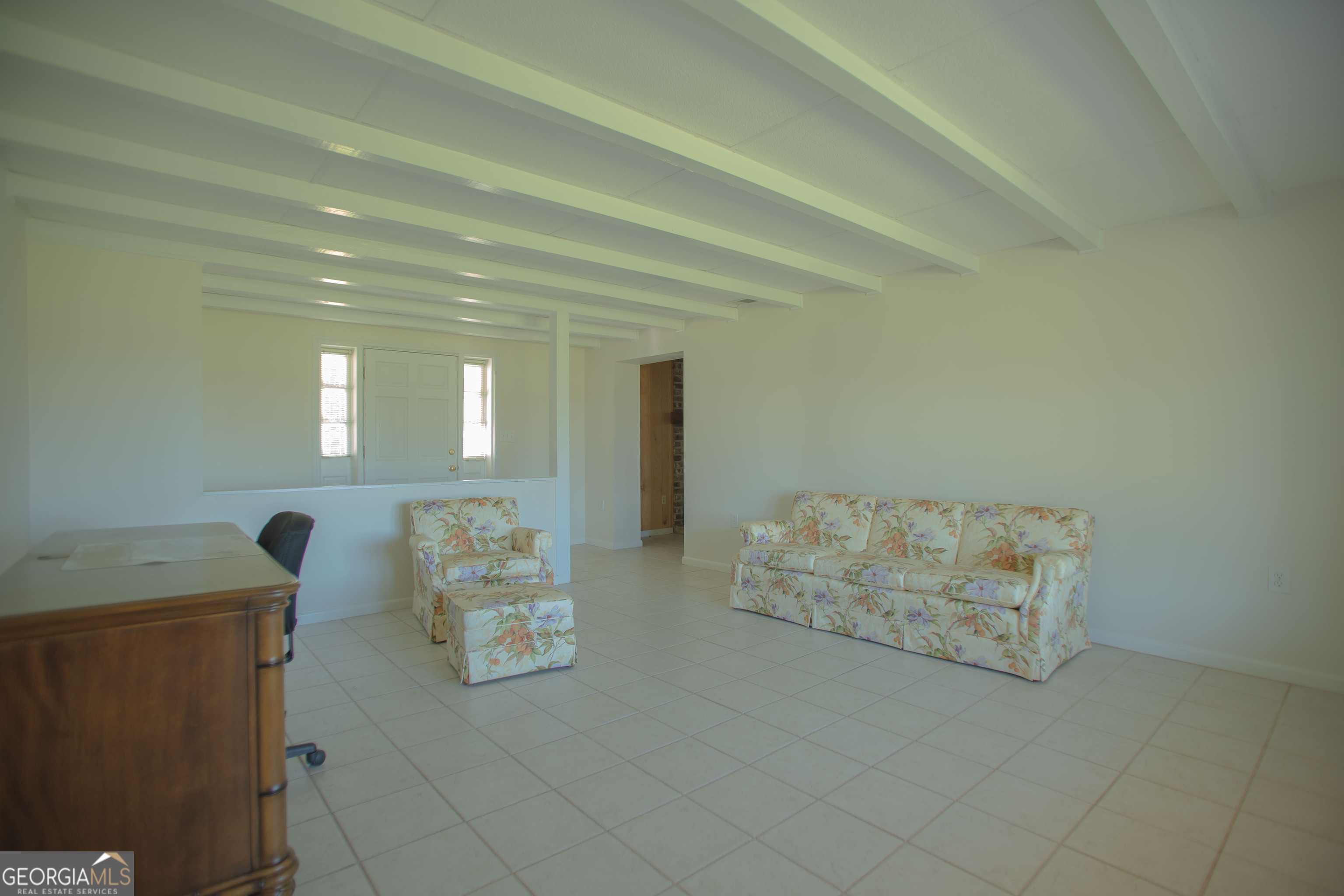 743 Cattle Hammock Road Midway, GA 31320 - Photo 53 of 63 a living room with furniture and painting on the wall