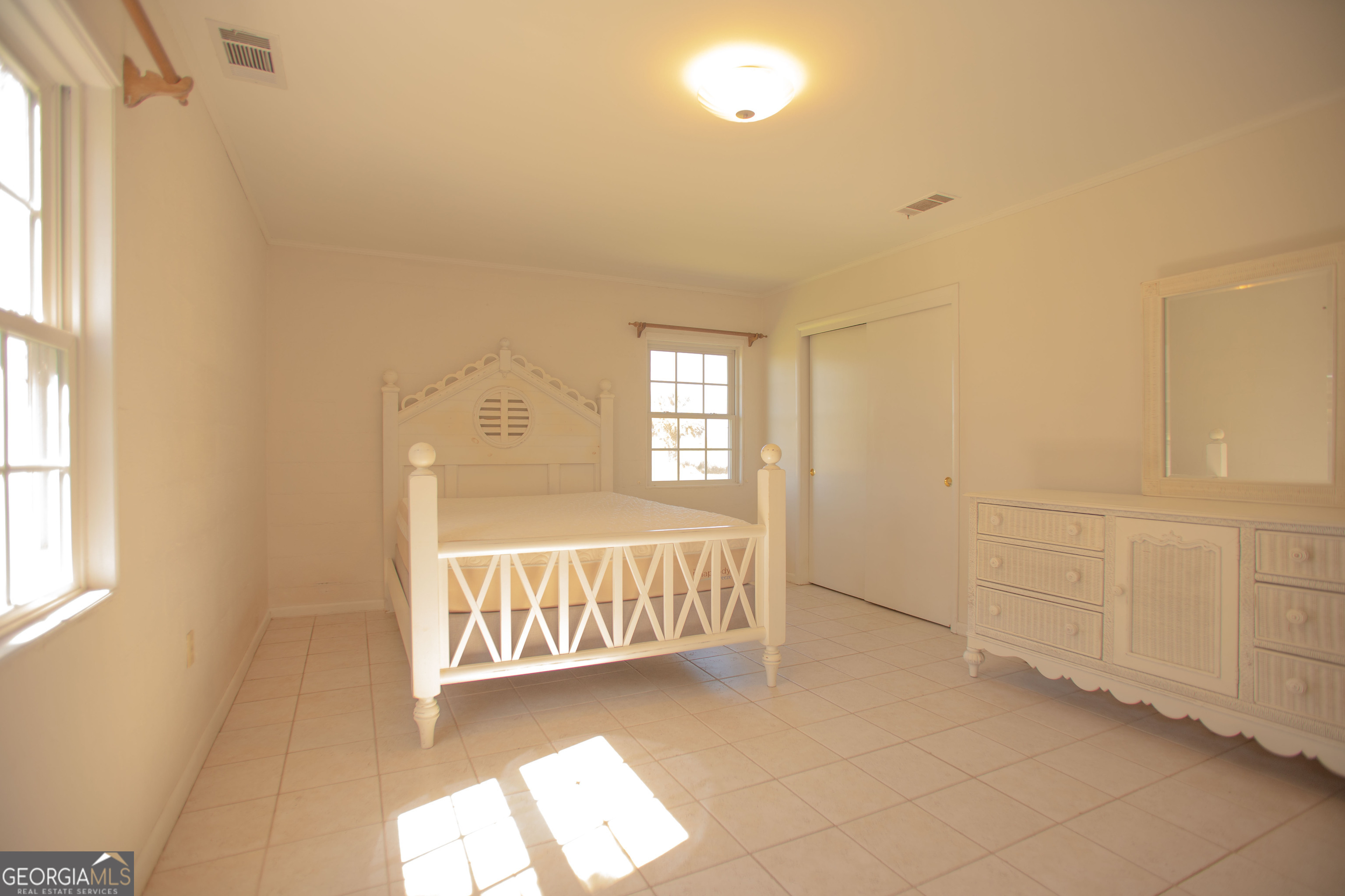 743 Cattle Hammock Road Midway, GA 31320 - Photo 58 of 63 a view of a bedroom with window