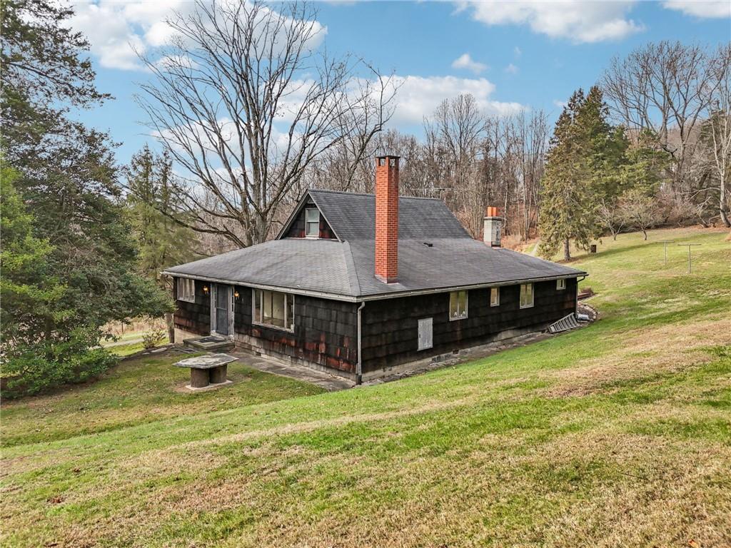 189 Lupyan Road New Alexandria, PA 15670 - Photo 36 of 50 a view of a house with a wooden fence and a big yard