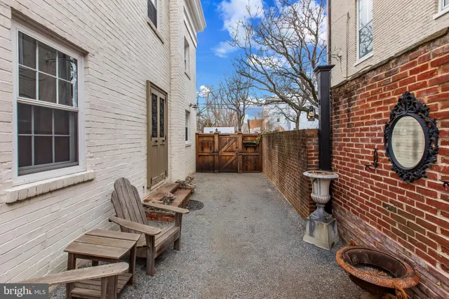 a backyard of a house with seating space
