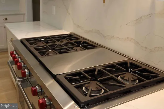 a close up of a stove in the kitchen