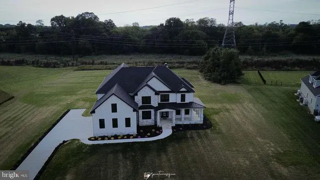 a house with river in front of it