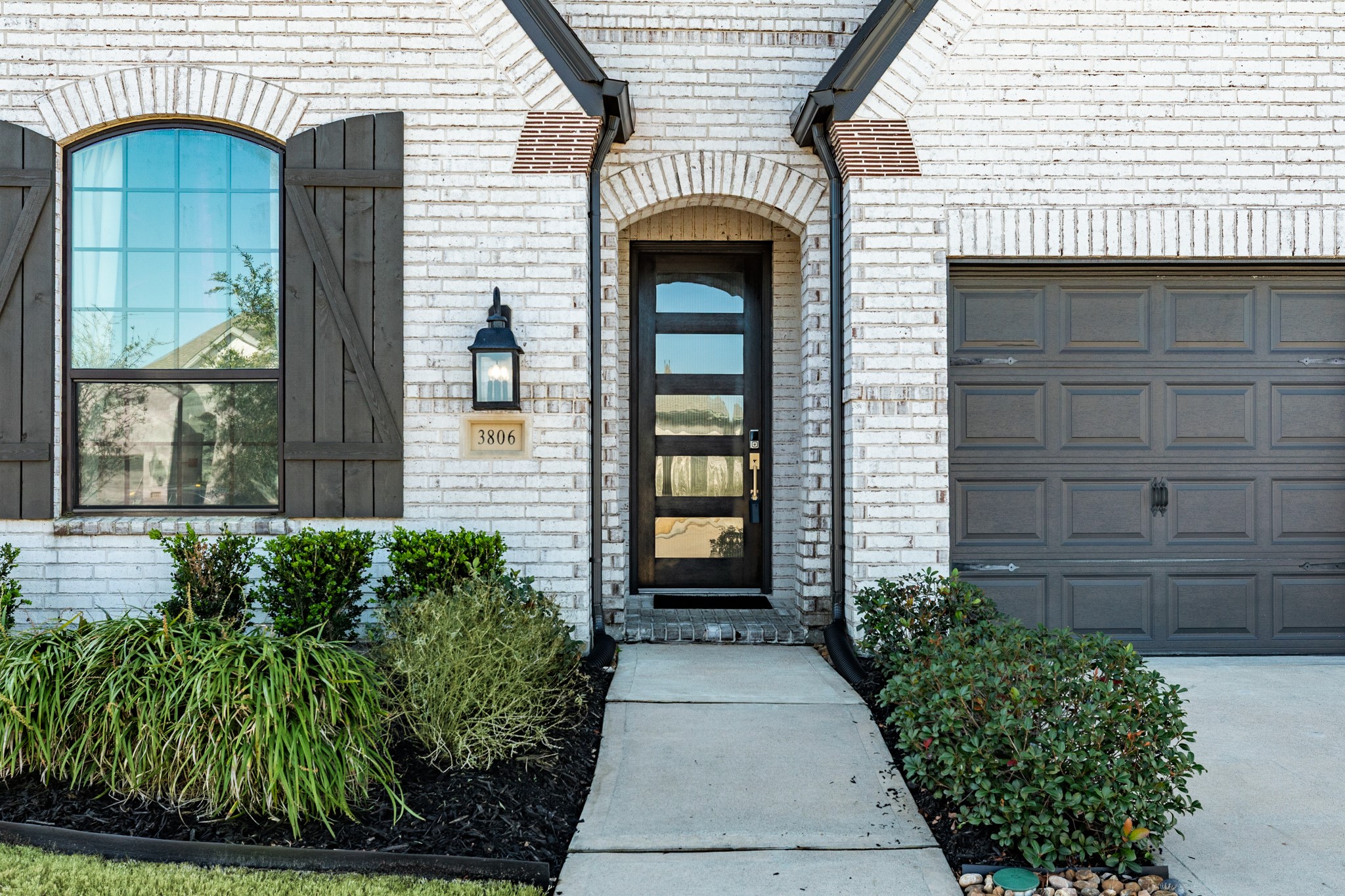 3806 Shackleton Court Rosharon, TX 77583 - Photo 4 of 50 This wood and glass door is indeed very elegant, a beautiful addition to any entryway.
