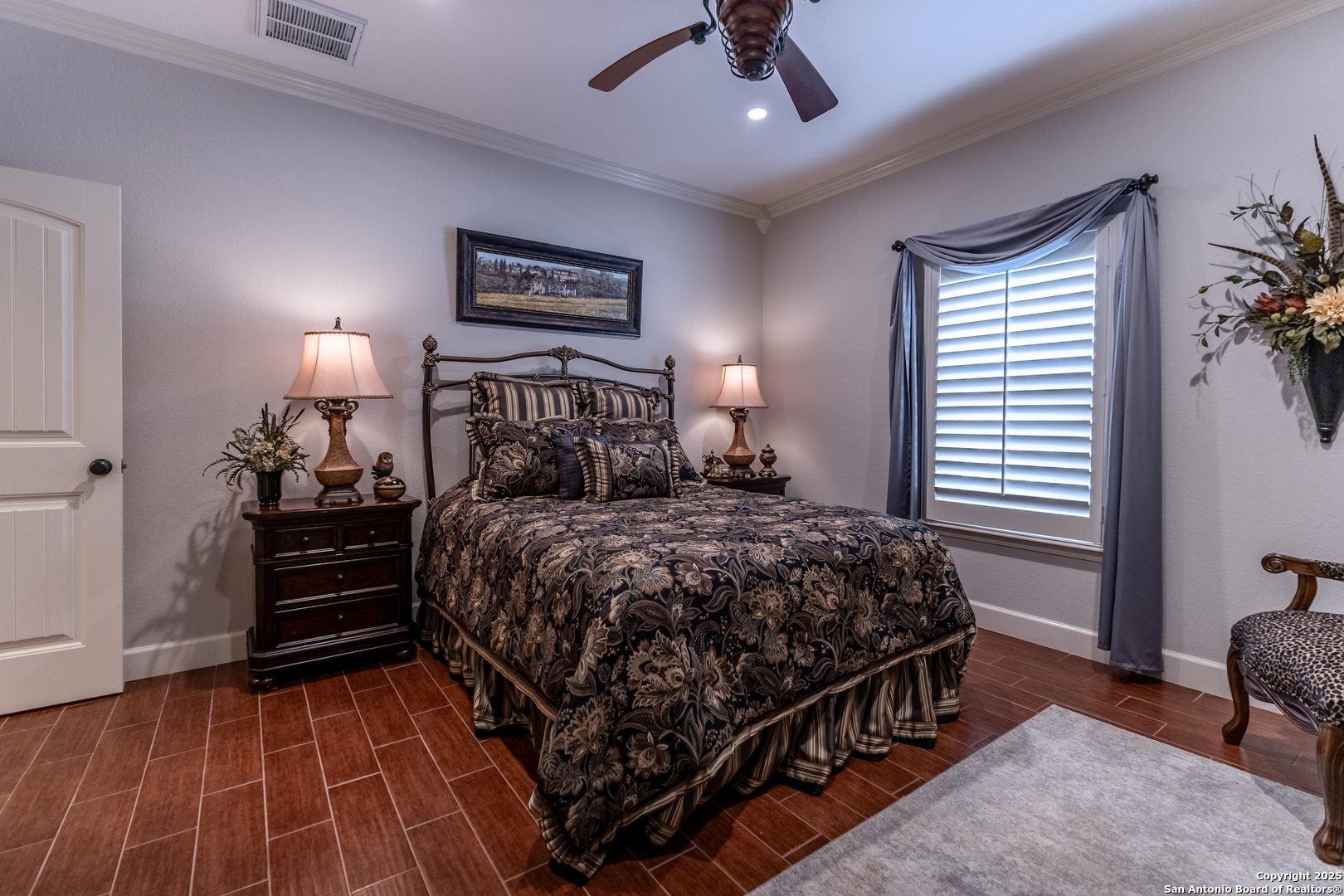 935 Danda Lane Del Rio, TX 78840 - Photo 15 of 38 a bedroom with a bed and a chandelier