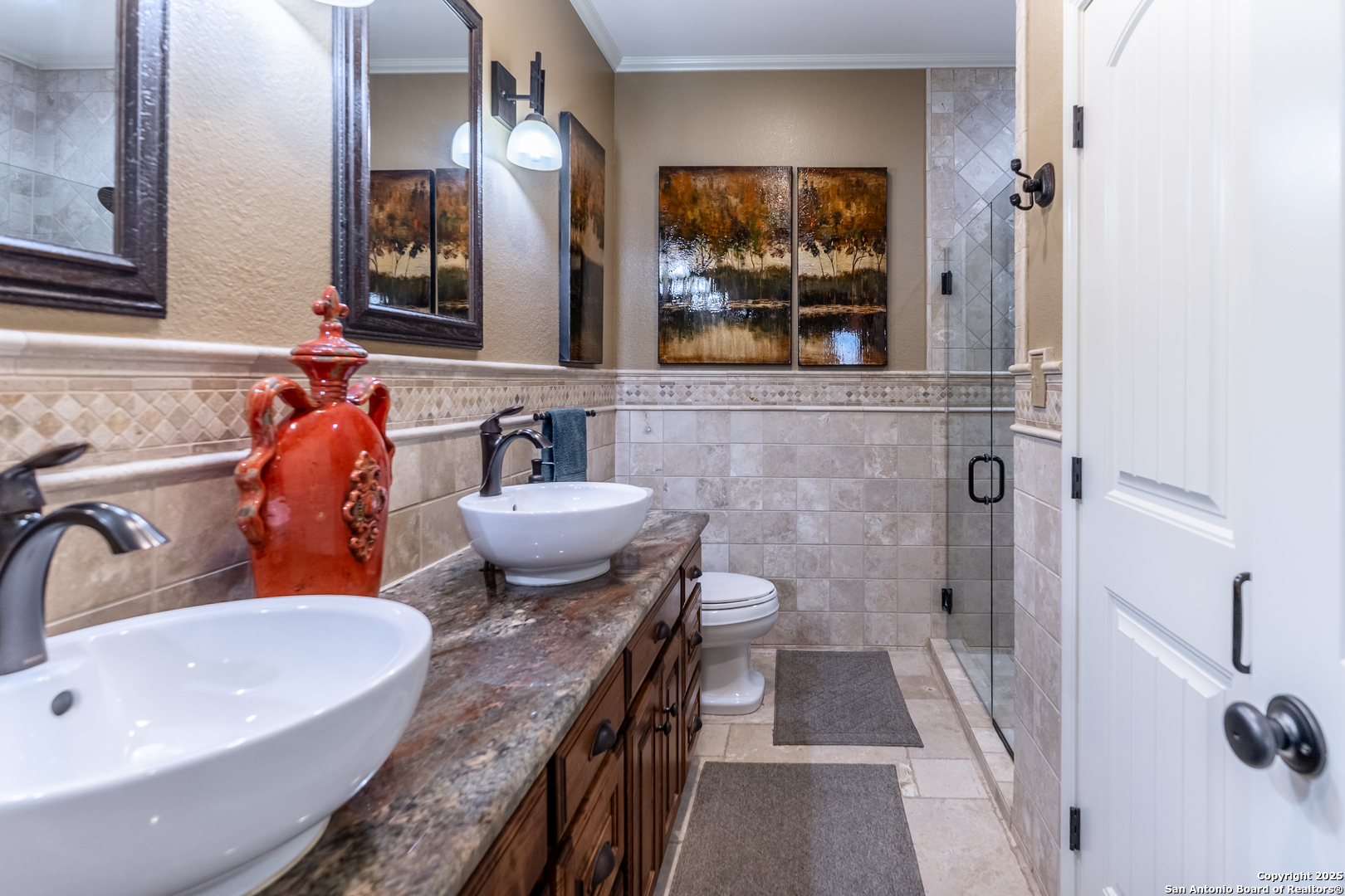 935 Danda Lane Del Rio, TX 78840 - Photo 16 of 38 a bathroom with a granite countertop sink and a large mirror