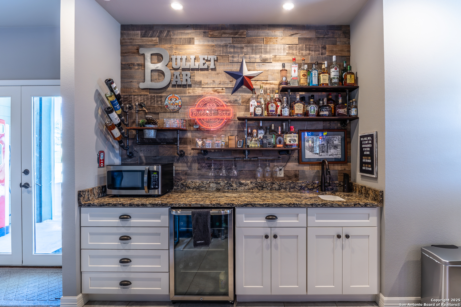 935 Danda Lane Del Rio, TX 78840 - Photo 26 of 38 a kitchen with stainless steel appliances granite countertop a sink and cabinets