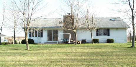 2596 Karr Road Belvidere, IL 61008 - Photo 6 of 6 a view of a house with a yard