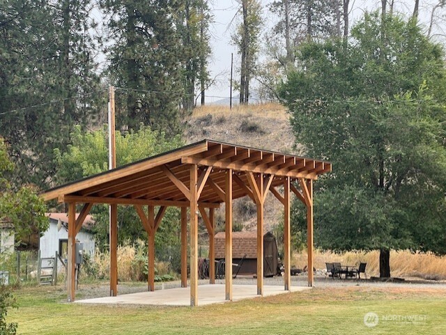 29 Twisp Airport Road Twisp, WA 98856 - Photo 2 of 19 a view of a swimming pool with a patio