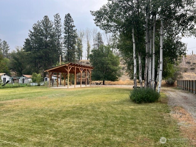 29 Twisp Airport Road Twisp, WA 98856 - Photo 3 of 19 a front view of a house with a yard