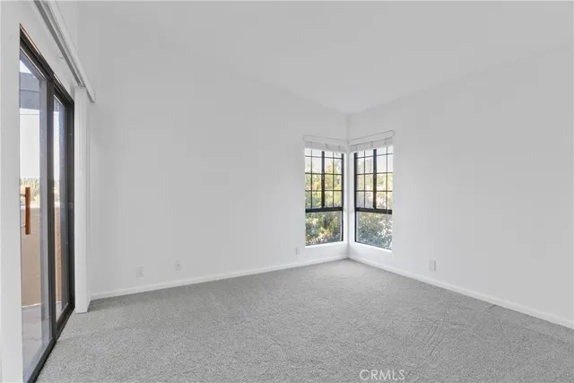 a view of cabinets with granite countertop